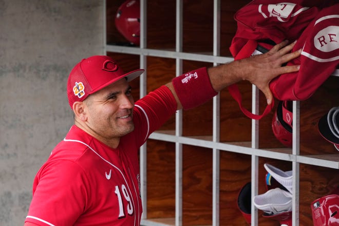 Joey Votto, without saying so, seemed to realize that starting the season on the disabled list is a distinct possibility.