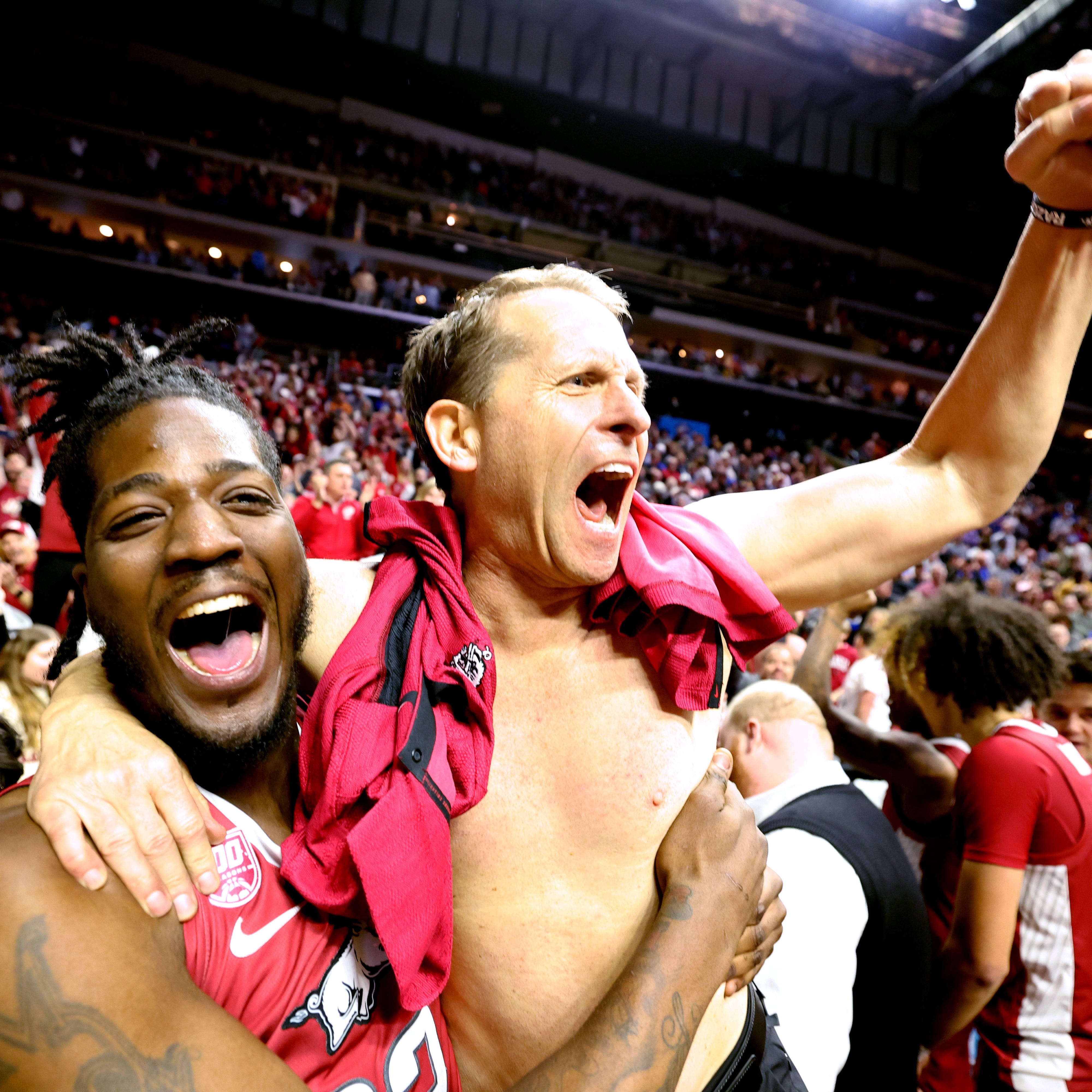 Arkansas head coach Eric Musselman ripped his shirt off in celebration after the Razorbacks' second-round win over No. 1 Kansas.