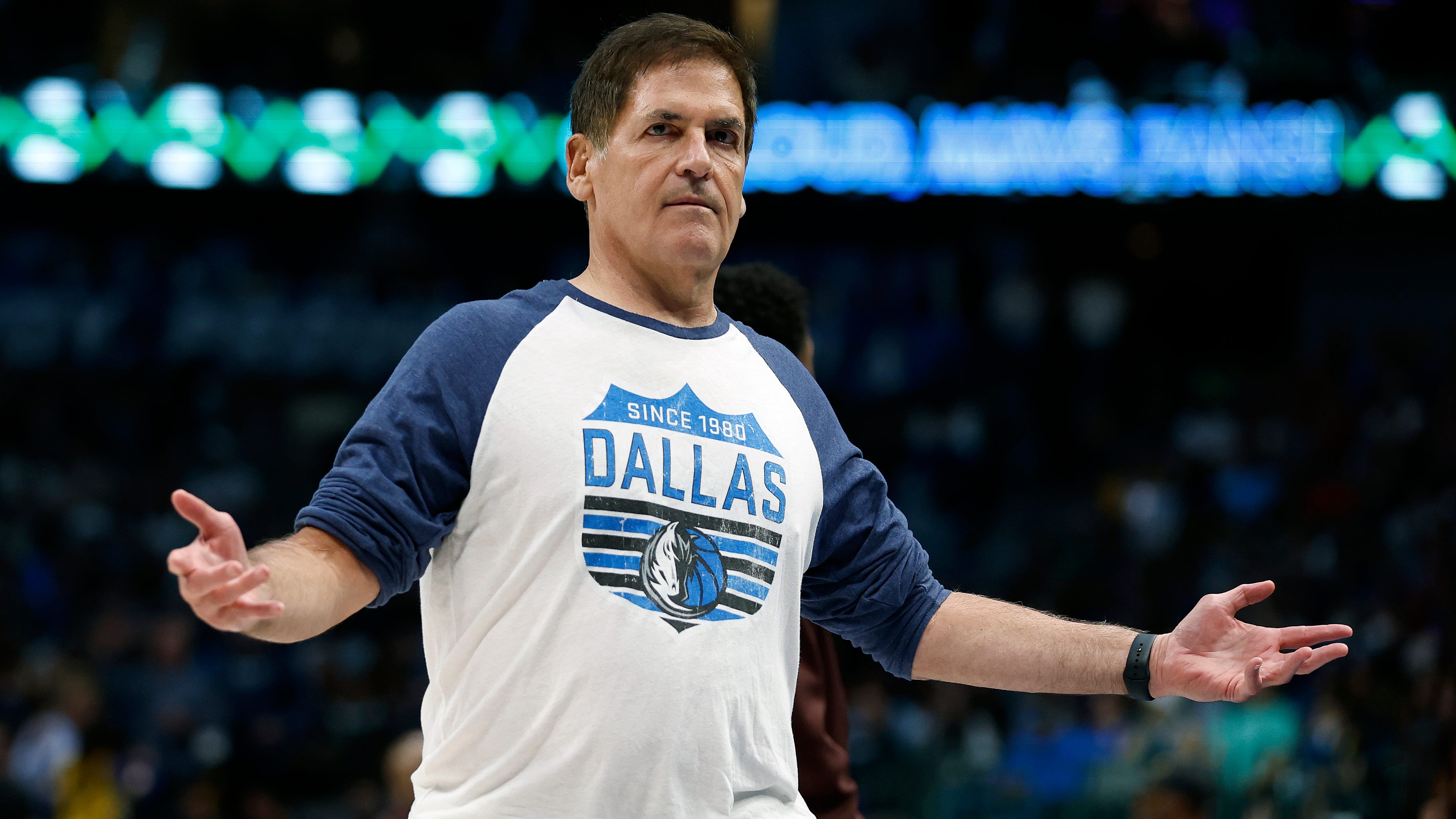 Dallas Mavericks owner Mark Cuban reacts during a timeout in Wednesday's game against the Golden State Warriors.