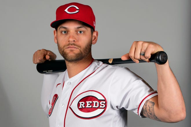 Feb 21, 2023; Goodyear, AZ, USA; Cincinnati Reds infielder Chad Pinder (9) poses for images on photo day at the Reds training facility. Mandatory Credit: Rick Scuteri-USA TODAY Sports