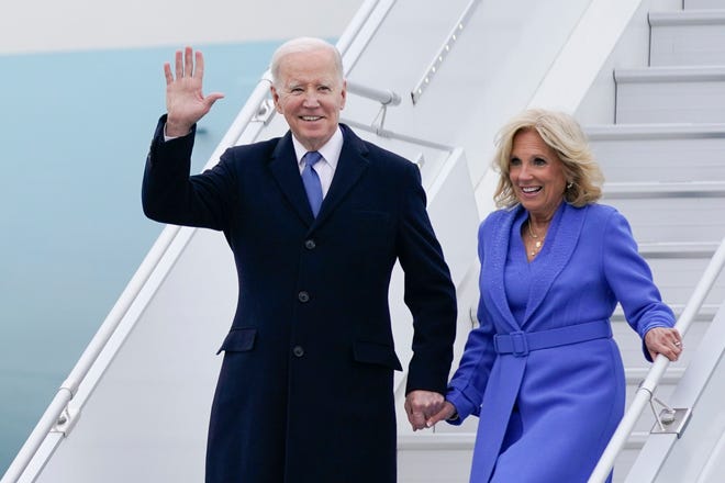 President Joe Biden waves as he and first lady Jill Biden exit Air Force One as they arrive at Ottawa International Airport, Thursday, March 23, 2023, in Ottawa, Canada. (AP Photo/Andrew Harnik) ORG XMIT: CANH420