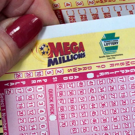 A Mega Millions entry card is displayed at the Cranberry Super Mini Mart in Cranberry, Pa. in January.