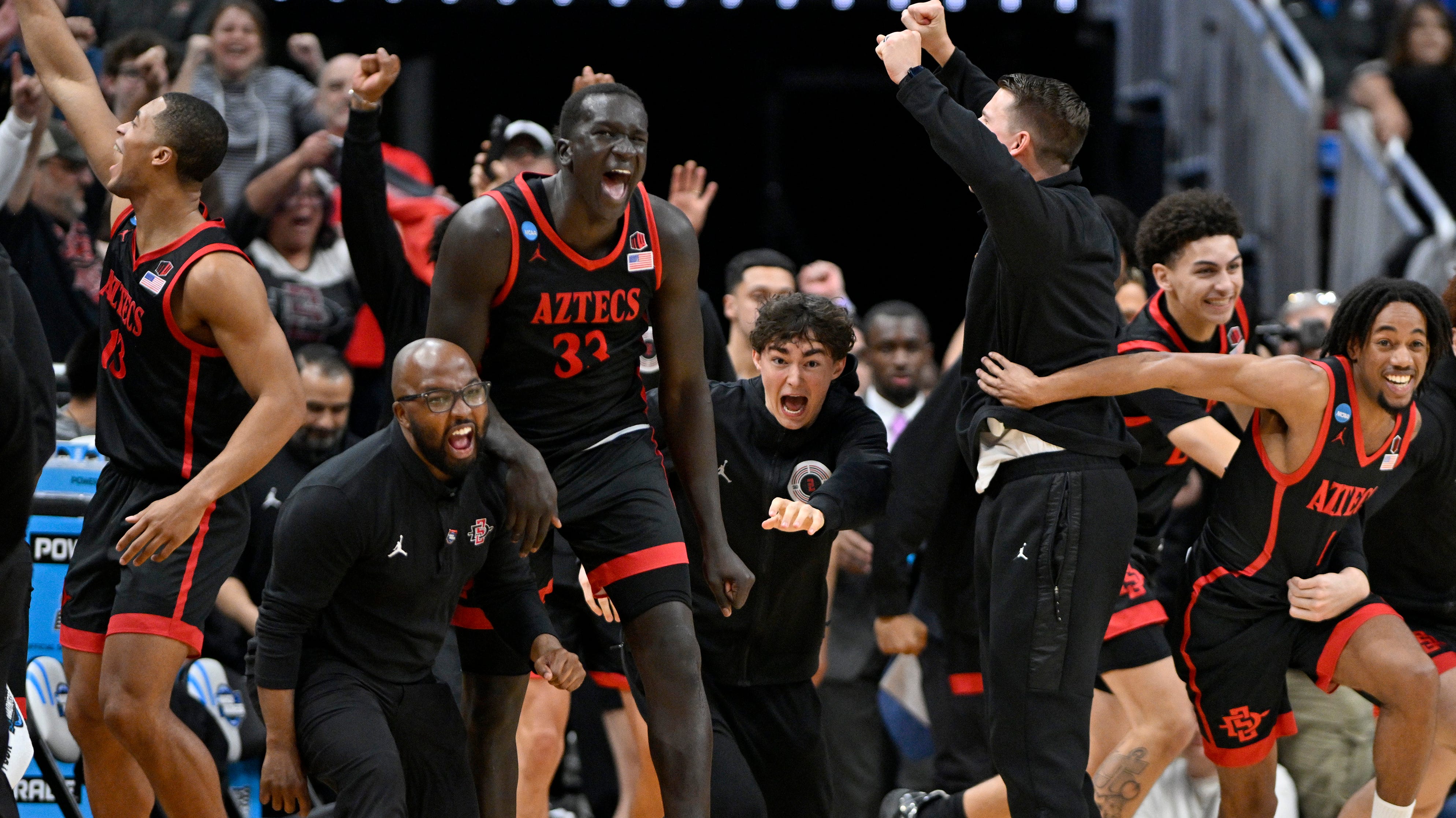 San Diego State players celebrate after defeating Alabama in the Sweet 16.