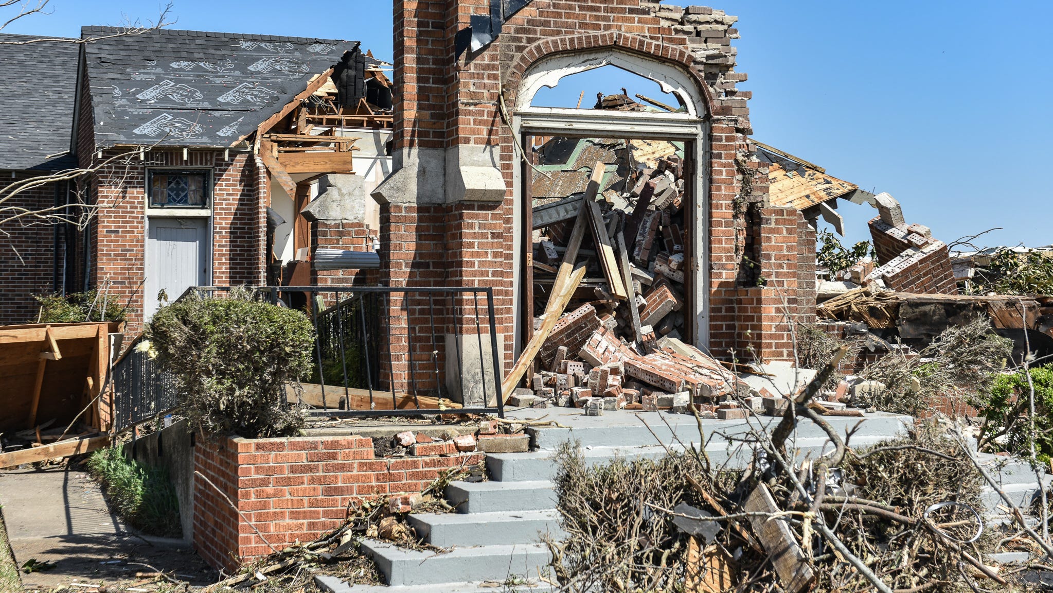What remains of the Chapel of the Cross Episcopal Church is seen in Rolling Fork on Sunday.