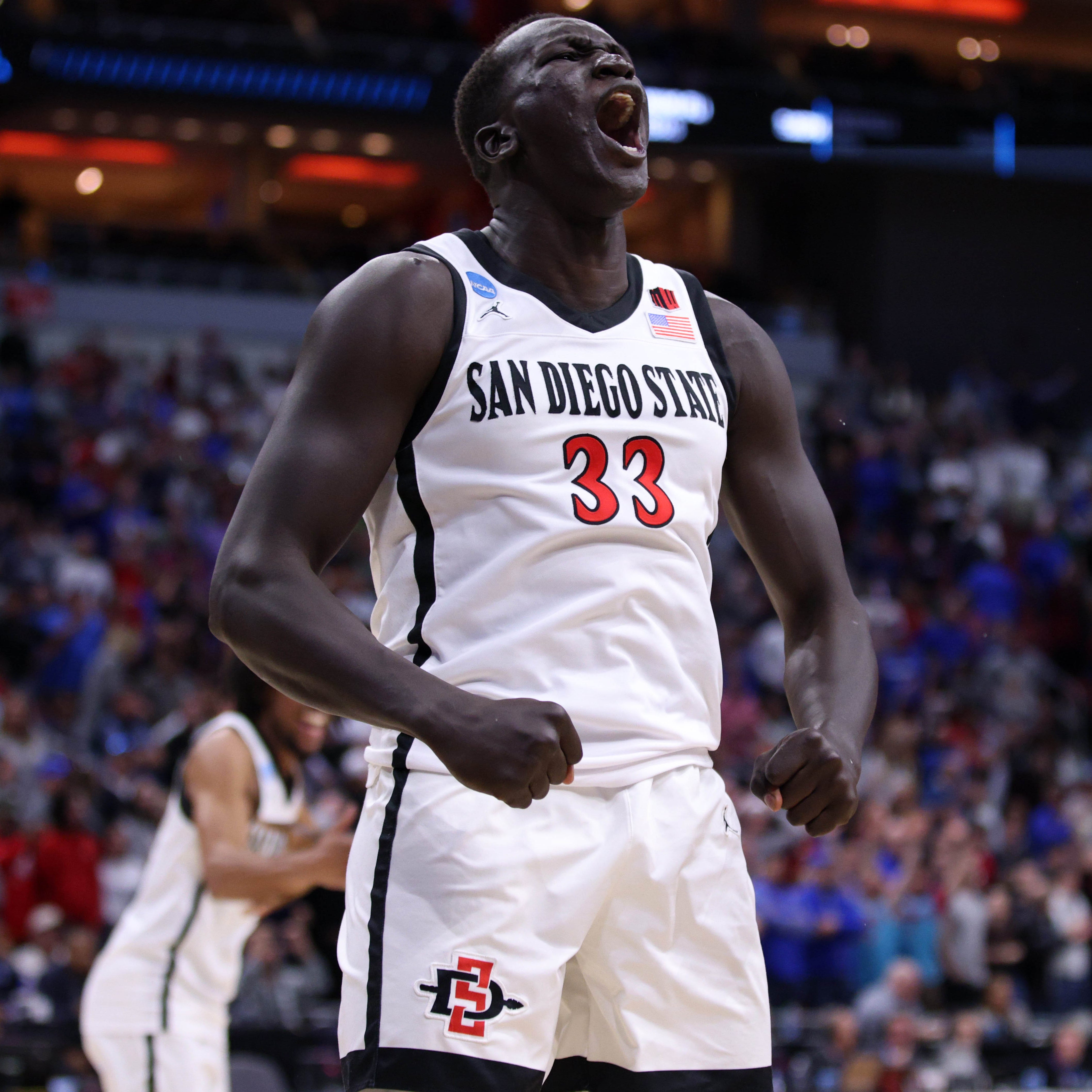 San Diego State forward Aguek Arop (33) celebrates after the Aztecs defeated Creighton in the NCAA men's tournament South Regional championship game at KFC YUM! Center.