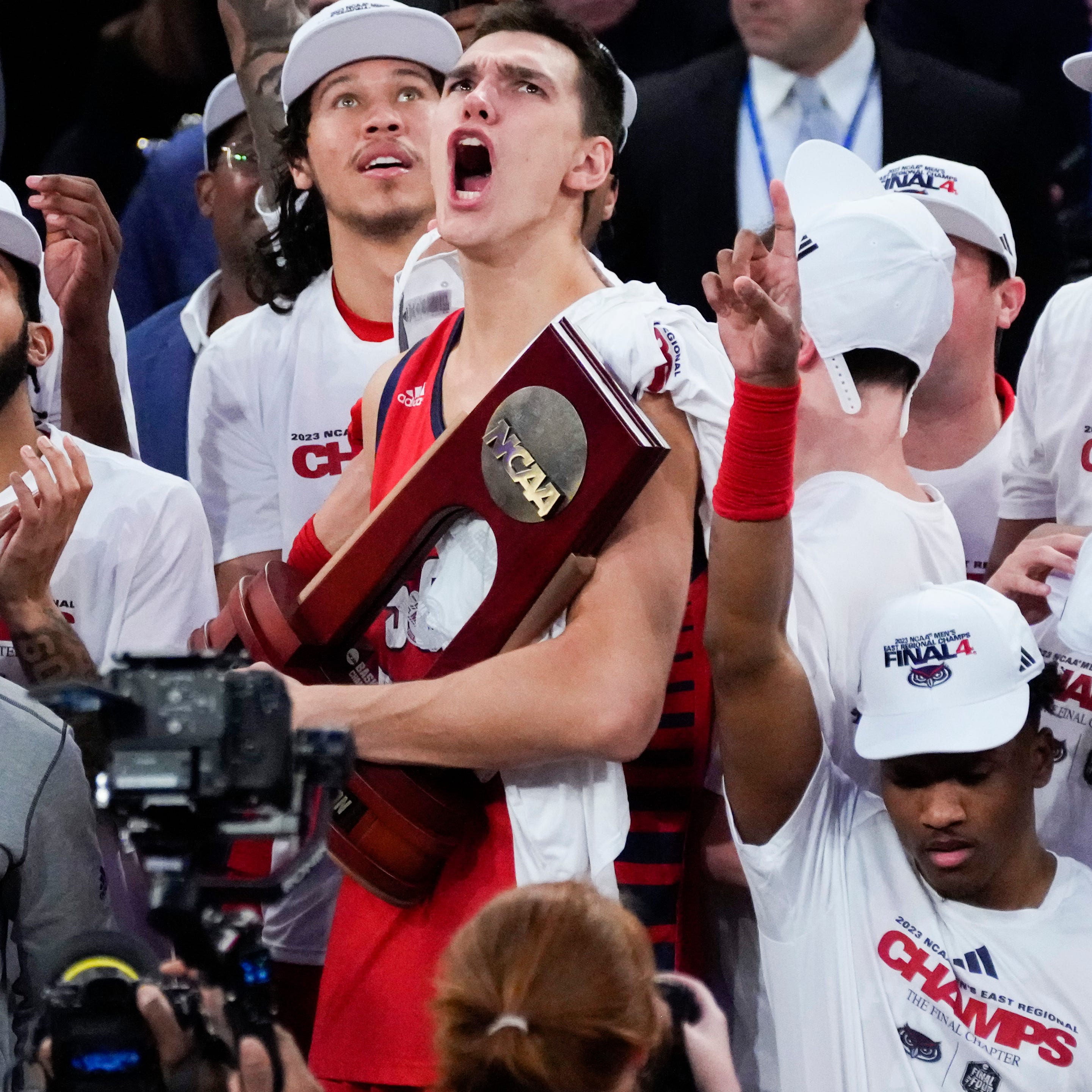 Florida Atlantic center Vladislav Goldin, center, celebrates after the Owls defeated Kansas State in the East Regional final of the NCAA men's tournament. at Madison Square Garden.