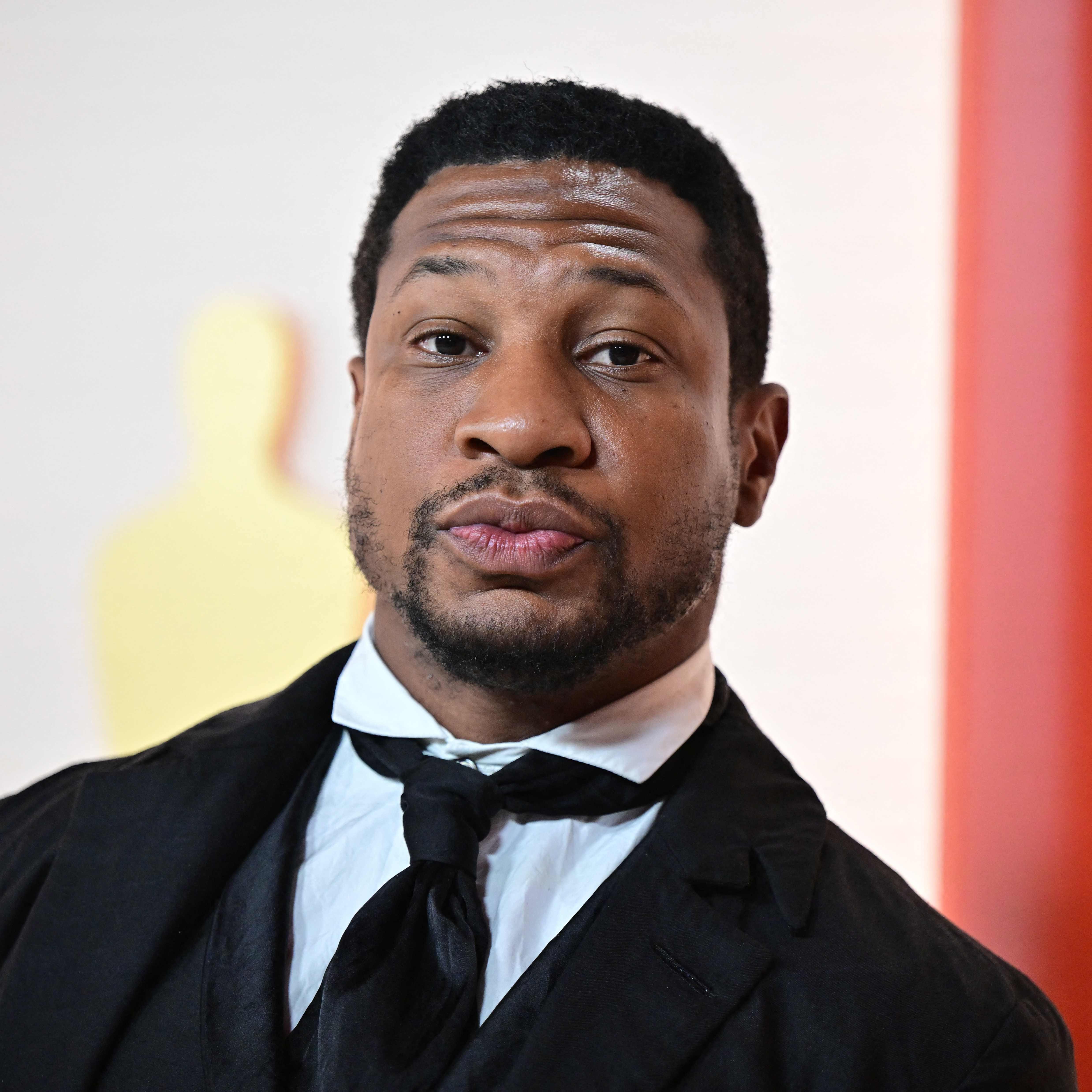 US actor Jonathan Majors attends the 95th Annual Academy Awards at the Dolby Theatre in Hollywood, California on March 12, 2023. (Photo by Frederic J. Brown / AFP) (Photo by FREDERIC J. BROWN/AFP via Getty Images) ORIG FILE ID: AFP_33B46MM.jpg
