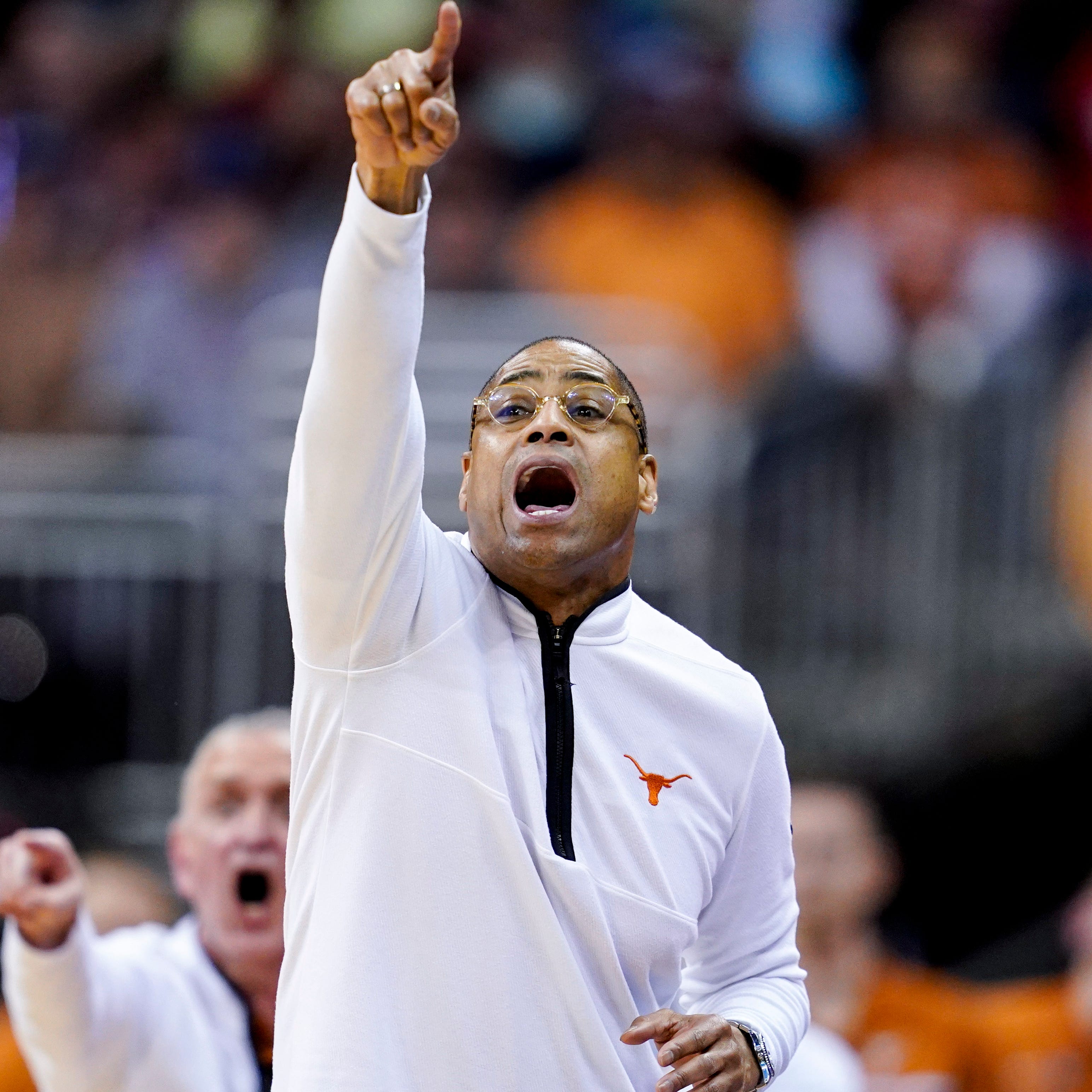 Texas coach Rodney Terry yells to his team during their game against Miami (Fla.) in the Midwest Regional championship game of the NCAA men's tournament at the T-Mobile Center.