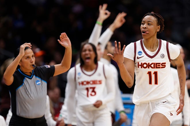 Virginia Tech's D'asia Gregg celebrates after making a 3-pointer.