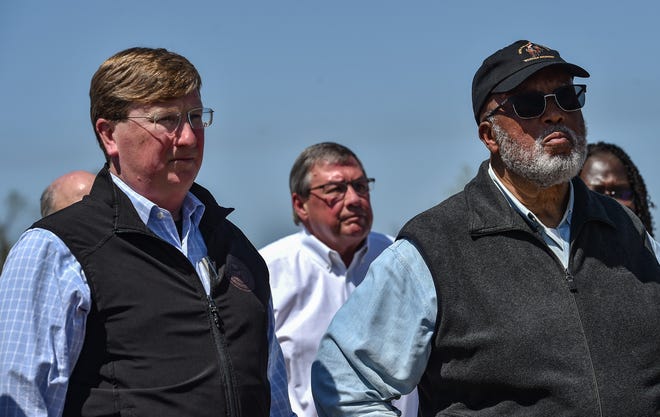 Gov. Tate Reeves (left), alongside U.S. Rep. Bennie Thompson (right) are seen at a press conference following Friday's deadly tornado in Rolling Fork, Miss., Sunday, March 26, 2023.