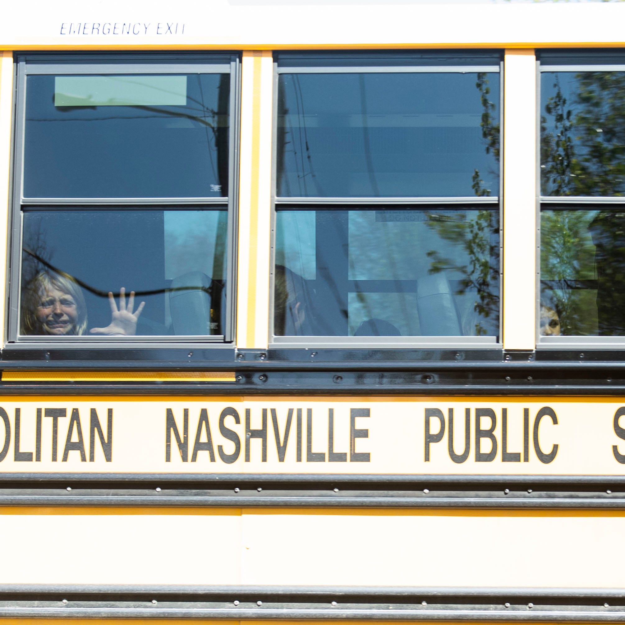 A child weeps while on the bus leaving, The Covenant School, following a mass shooting a the school Monday morning in Nashville , Tenn., Monday, March 27, 2023. Three students and three adults were killed. The shooter was killed by police on the scene. Students were transported from Covenant School to a reunification center at Woodmont Baptist Church.