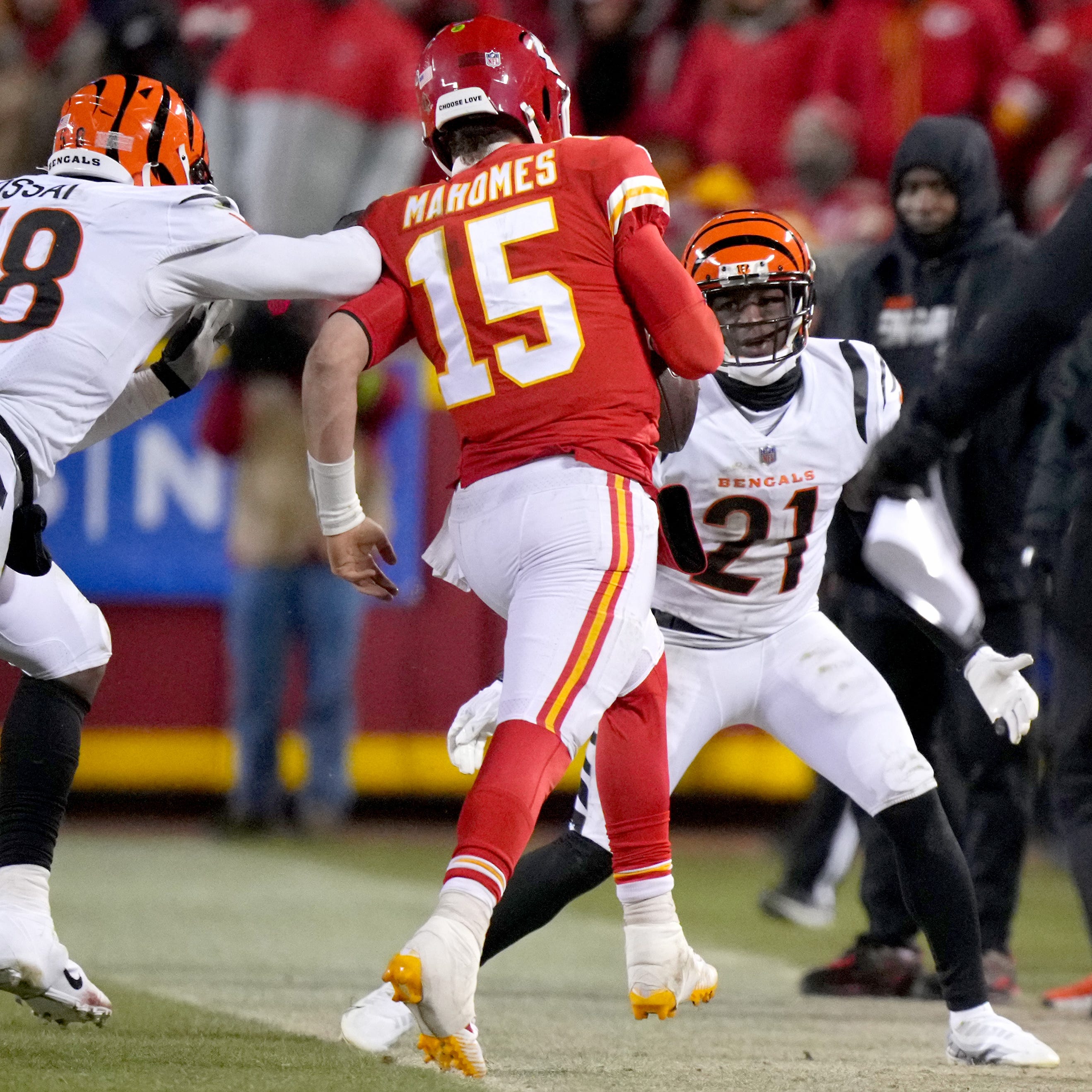 The Cincinnati Bengals' Joseph Ossai is called for a roughing-the-passer penalty as Kansas City Chiefs quarterback Patrick Mahomes is hit out of bounds during the fourth quarter of the AFC championship game.