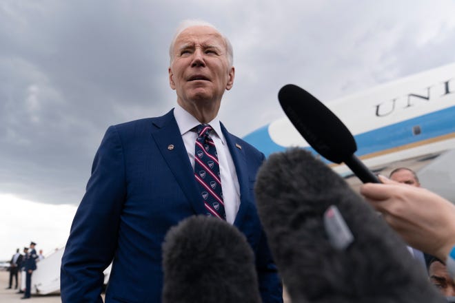 President Joe Biden speaks to reporters before boarding Air Force One at Raleigh-Durham International Airport in Morrisville, N.C., Tuesday, March 28, 2023, en route to Washington. (AP Photo/Carolyn Kaster) ORG XMIT: NCCK115