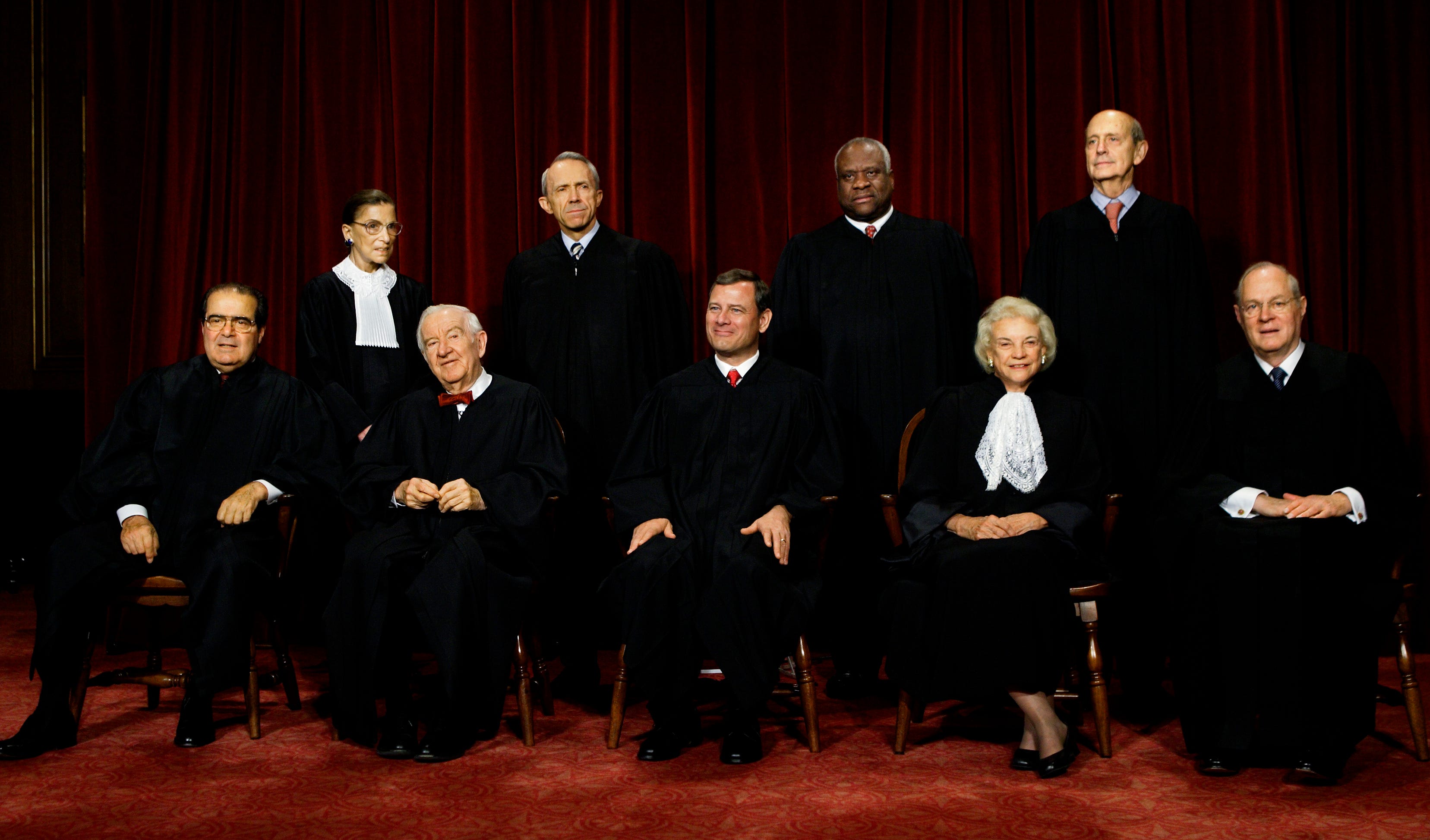 The justices of the U.S. Supreme Court gather for a group portrait at the Supreme Court Building in Washington, Monday, Oct. 31, 2005. Seated, from left: Antonin Scalia, John Paul Stevens, John G. Roberts Jr., Sandra Day O'Connor, and Anthony M. Kennedy. Standing, from left: Ruth Bader Ginsburg, David Souter, Clarence Thomas, and Stephen Breyer.