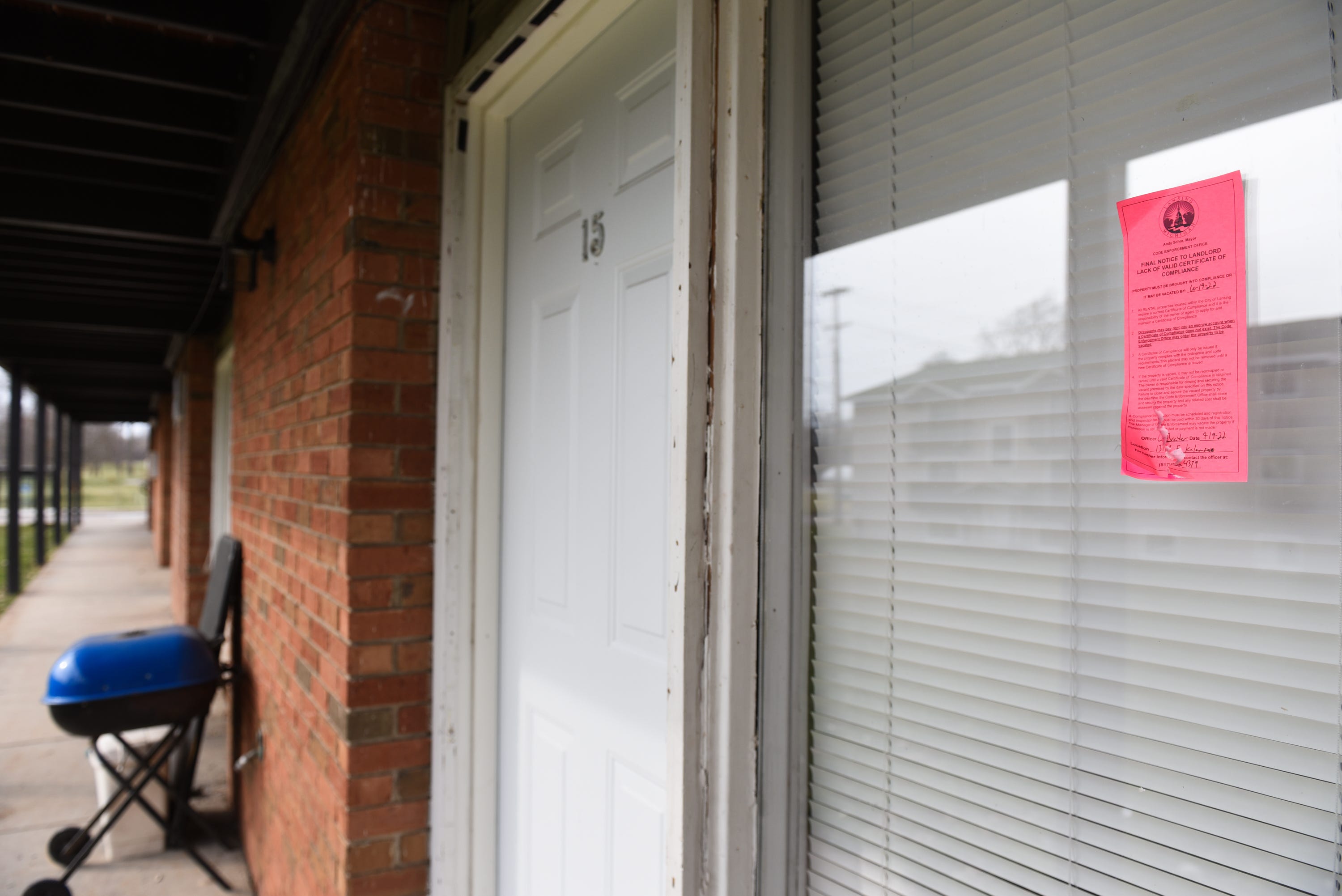 Lansing sues owners of redtagged apartments, pays for hotel for residents