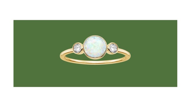 For an elegant three-stone style, opt for the Cassiopeia Opal & Diamond Ring from Brilliant Earth.