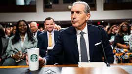 Ex-Starbucks CEO faces off with senators