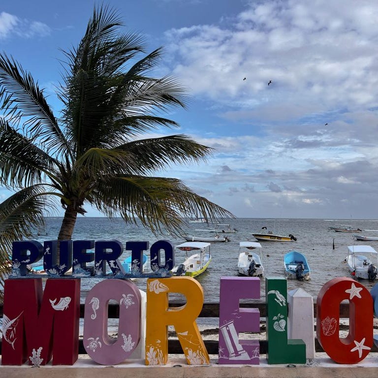 Boats are anchored off Puerto Morelos pier in Quintana Roo state, Mexico, on November 8, 2022.