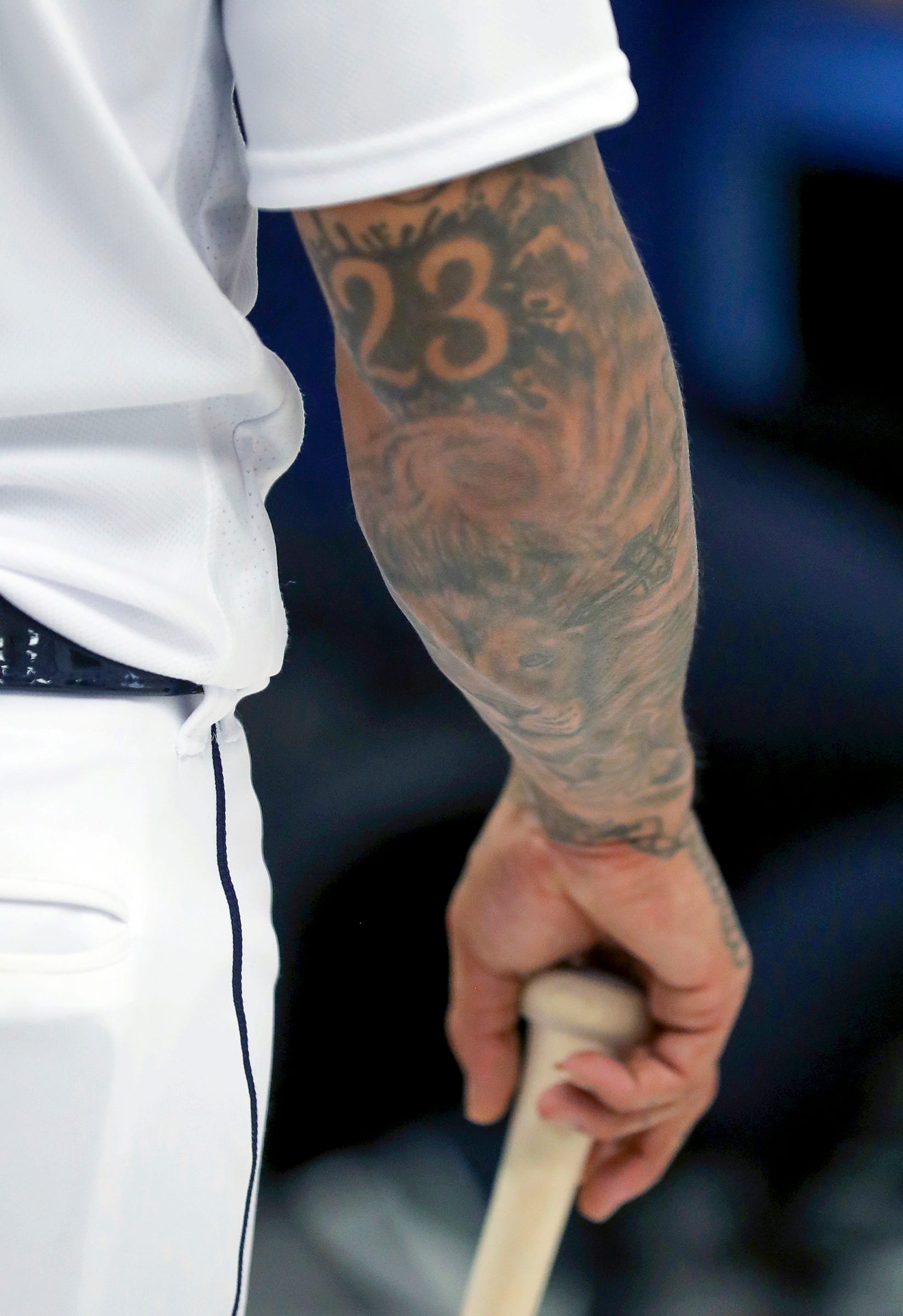 Tattoos seen in Detroit Tigers clubhouse reveal interesting stories