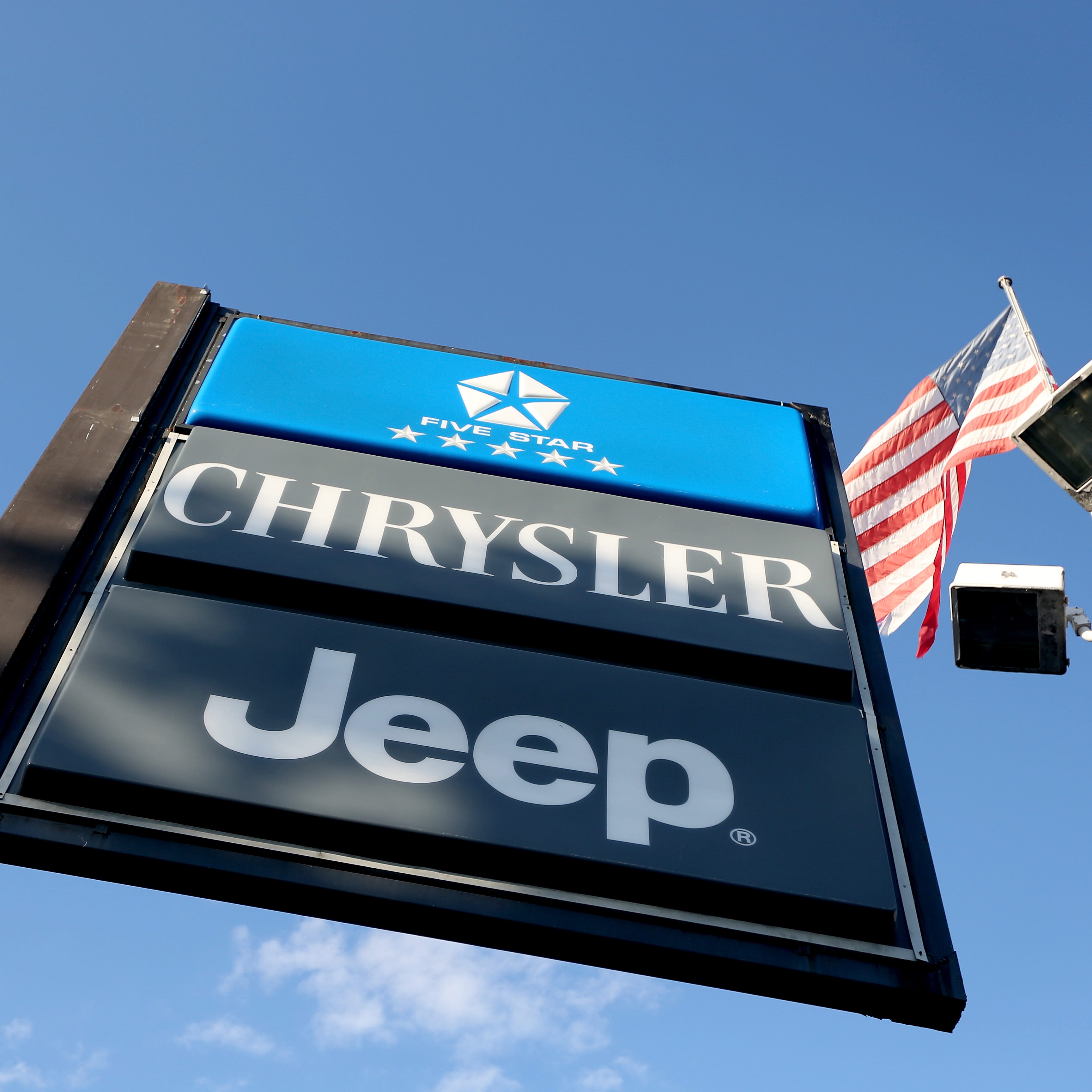 FILE - JUNE 3:  According to reports June 3, 2014, Chrysler announced May sales rose 17 percent, beating expectations of a 14 percent increase. HOLLYWOOD, FL - DECEMBER 03:  A sign stands at the Hollywood Chrysler Jeep dealership on December 3, 2013 in Hollywood, Florida. Chrysler's U.S. sales rose 16% in November with just over 142,000 vehicles sold last month for its best November in six years.  (Photo by Joe Raedle/Getty Images) ORG XMIT: 453802985 ORIG FILE ID: 453346999