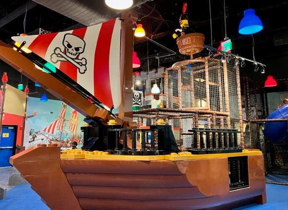 Guests can climb aboard a kid-size ship in Pirate Adventure Land.