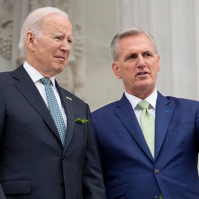 President Joe Biden talks with House Speaker Kevin McCarthy of Calif., on the House steps as they leave after attending an annual St. Patrick's Day luncheon gathering at the Capitol in Washington, Friday, March 17, 2023.