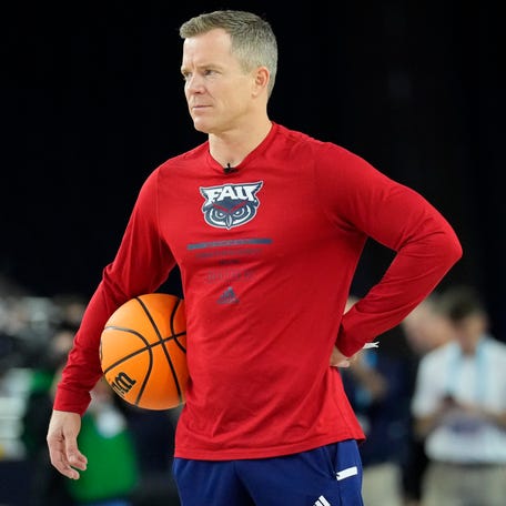 Florida Atlantic coach Dusty May watches during practice for the Final Four of the 2023 NCAA men's tournament at NRG Stadium.