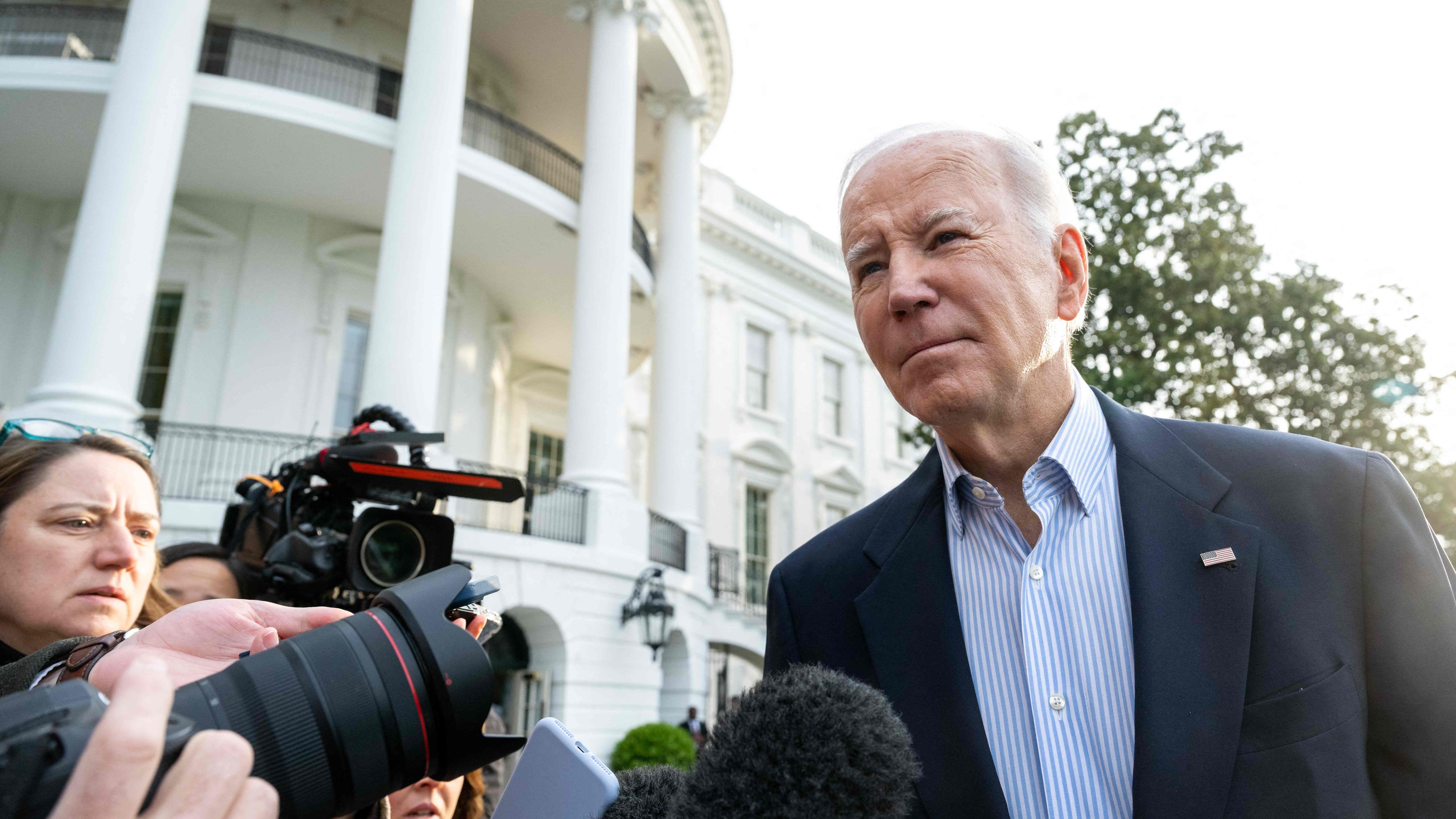 US President Joe Biden speaks to the media as he walks to Marine One prior to departure from the South Lawn of the White House in Washington, DC, March 31, 2023, as he travels to Mississippi to view tornado damage before going to Delaware for the weekend. (Photo by SAUL LOEB / AFP) (Photo by SAUL LOEB/AFP via Getty Images) ORIG FILE ID: AFP_33CE6CA.jpg