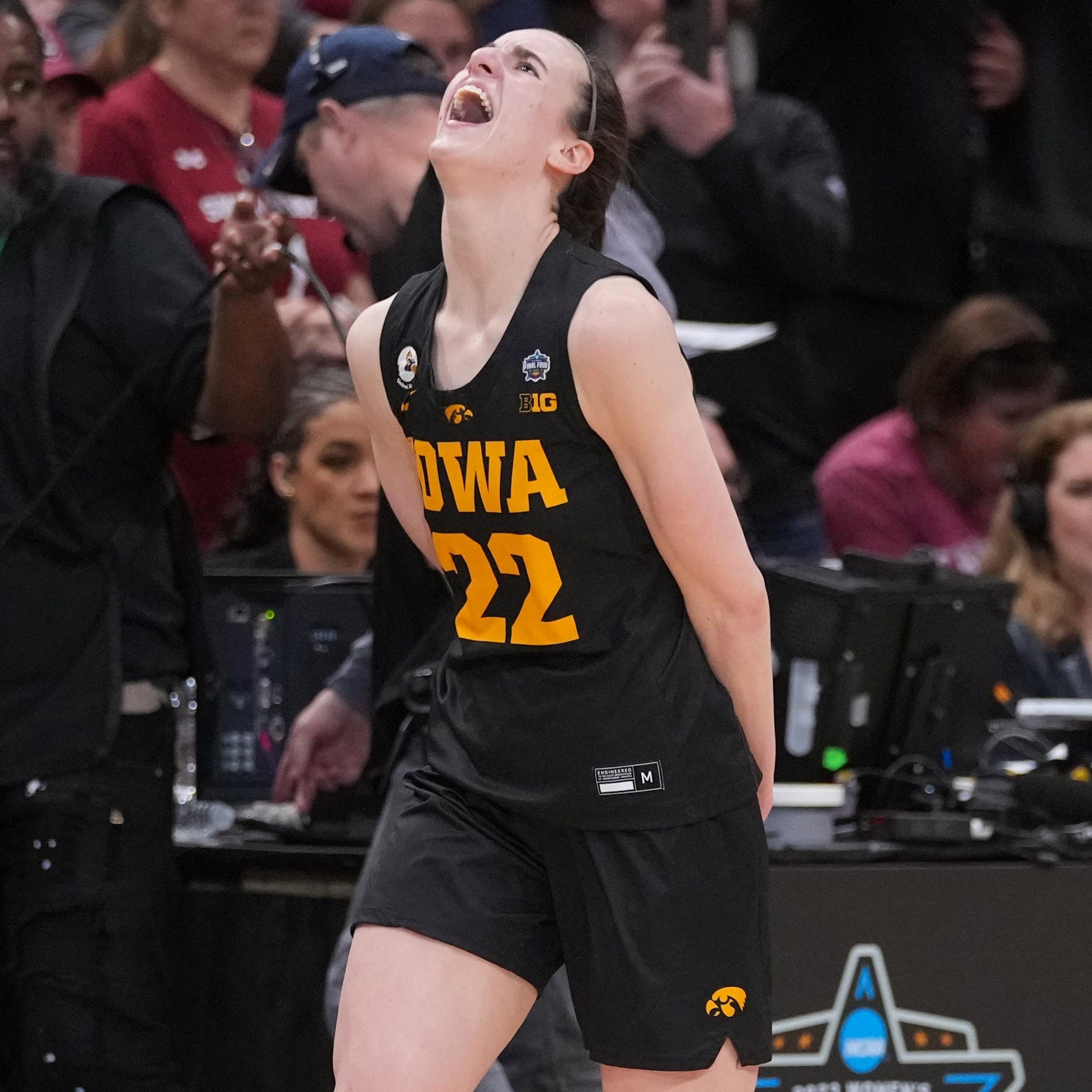 Caitlin Clark celebrates Iowa's win against South Carolina on Friday.