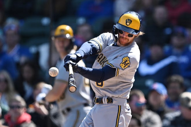Rookie second baseman Brice Turang gets the Brewers offense going with an RBI double in the second inning against the Cubs on Sunday.