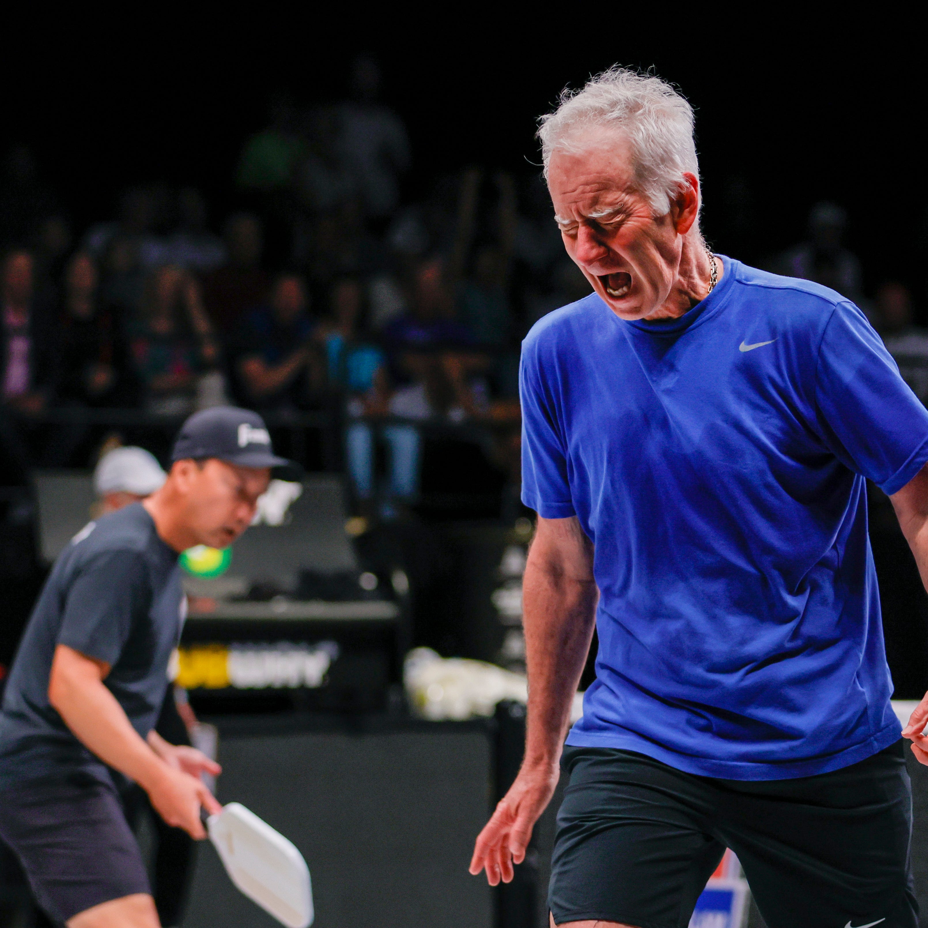 Apr 2, 2023; Hollywood, FL, USA; John McEnroe reacts during the Pickleball Slam doubles match against Andre Agassi (not pictured) and Andy Roddick (not pictured) at Hard Rock Live at Seminole Hard Rock Hotel & Casino.