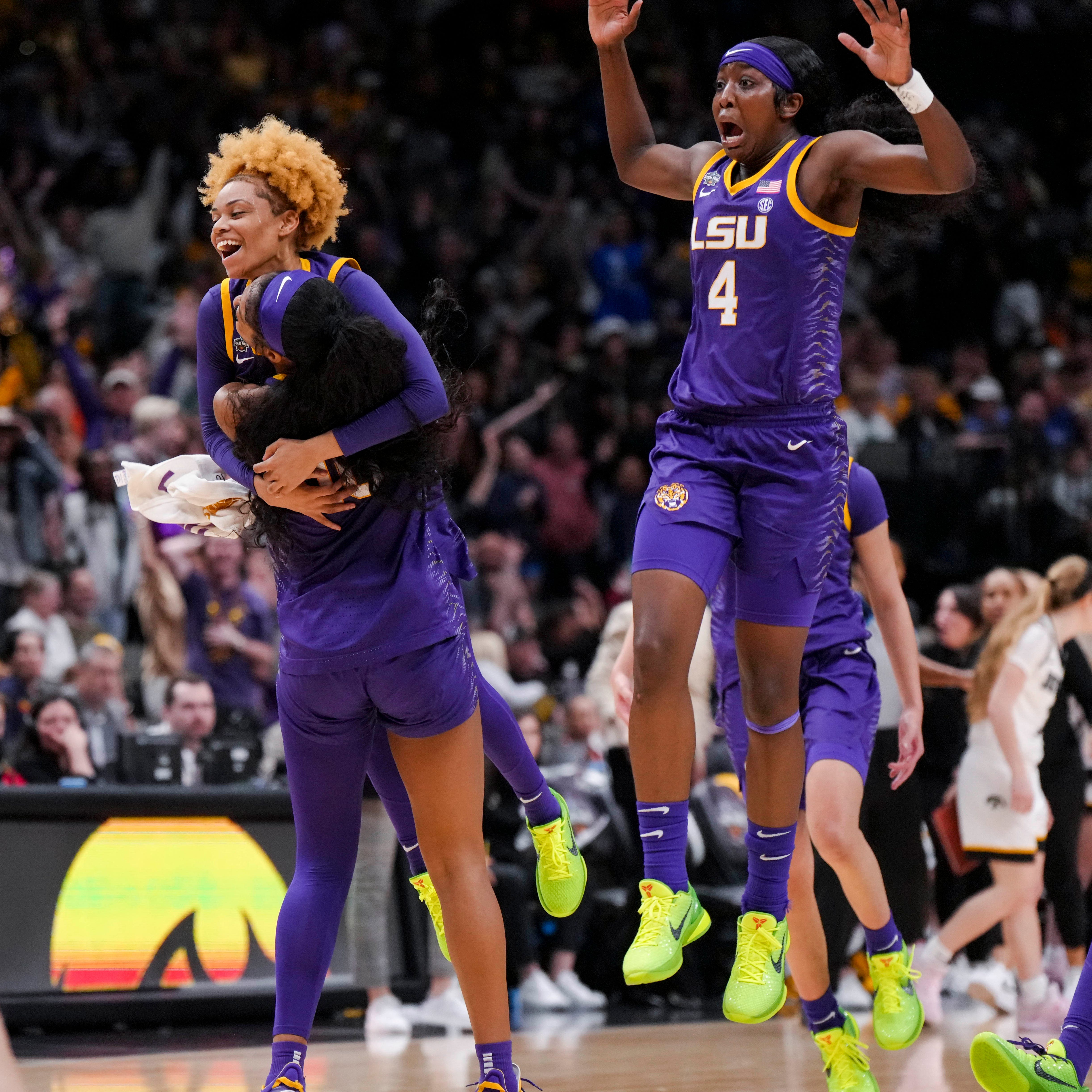 LSU players celebrate after beating Iowa to win the NCAA women's basketball national title.
