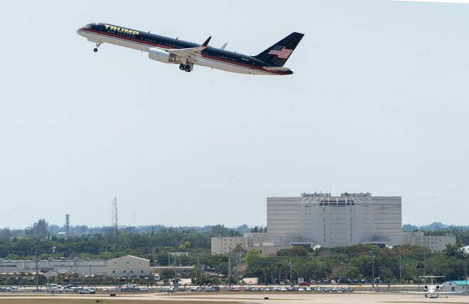 Former President Donald Trump leaves Palm Beach International Airport in West Palm Beach, Florida, on April 3, 2023. Trump is expected to fly to New York for his arraignment scheduled for Tuesday.