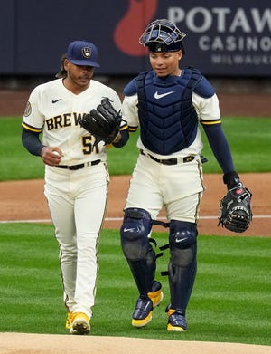 Milwaukee Brewers: 3 observations from their home opening drubbing of New York Mets 4 Milwaukee Brewers starting pitcher Freddy Peralta (51) and catcher William Contreras (24) talk during the first inning of their game against the New York Mets Monday, April 3, 2023 at American Family Field in Milwaukee, Wis.
