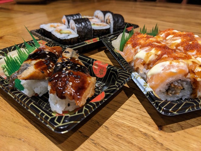 Eel sushi dishes purchased in the United Kingdom.  Grilled, barbequed eel is a delicacy in Japanese cuisine and often referred to as unagi on menus in the United States.