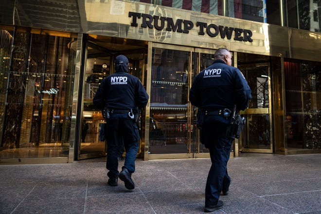 Counterterrorism police officers patrol outside Trump Tower on April 3, 2023, in New York City. Former President Donald Trump is scheduled to be arraigned the next day.