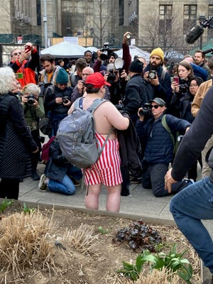 Michael Picard, 34, of Hartford Connecticut, speaks with members of the press outside Manhattan Criminal Court on April 4, 2023 — hours before former President Donald Trump was arraigned on 34 felony counts.