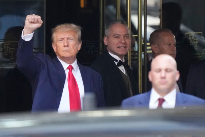 Former President Donald Trump leaves Trump Tower in New York on Tuesday.