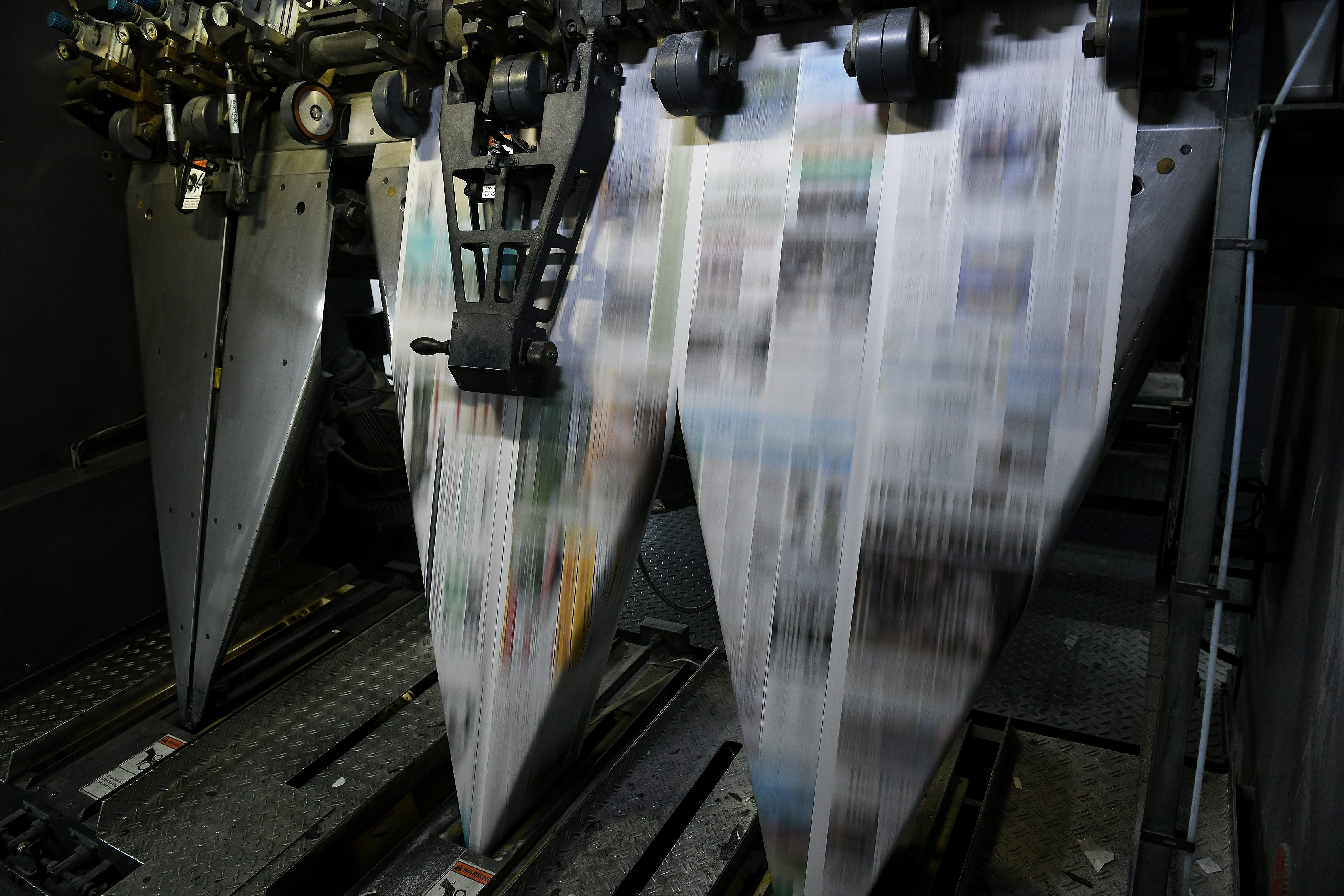 The Detroit News is printed and folded on No. 4 press at the Detroit Media Partnership Operations Facility in Sterling Heights.