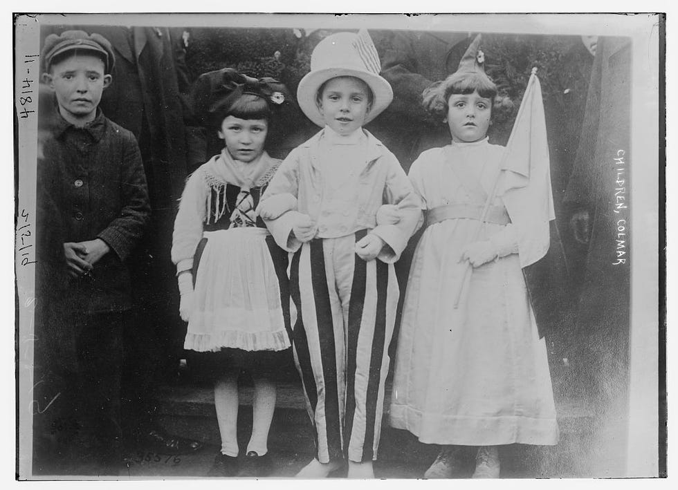 Children in Colmar, France, welcome U.S. soldiers, taken between 1915 and 1920.