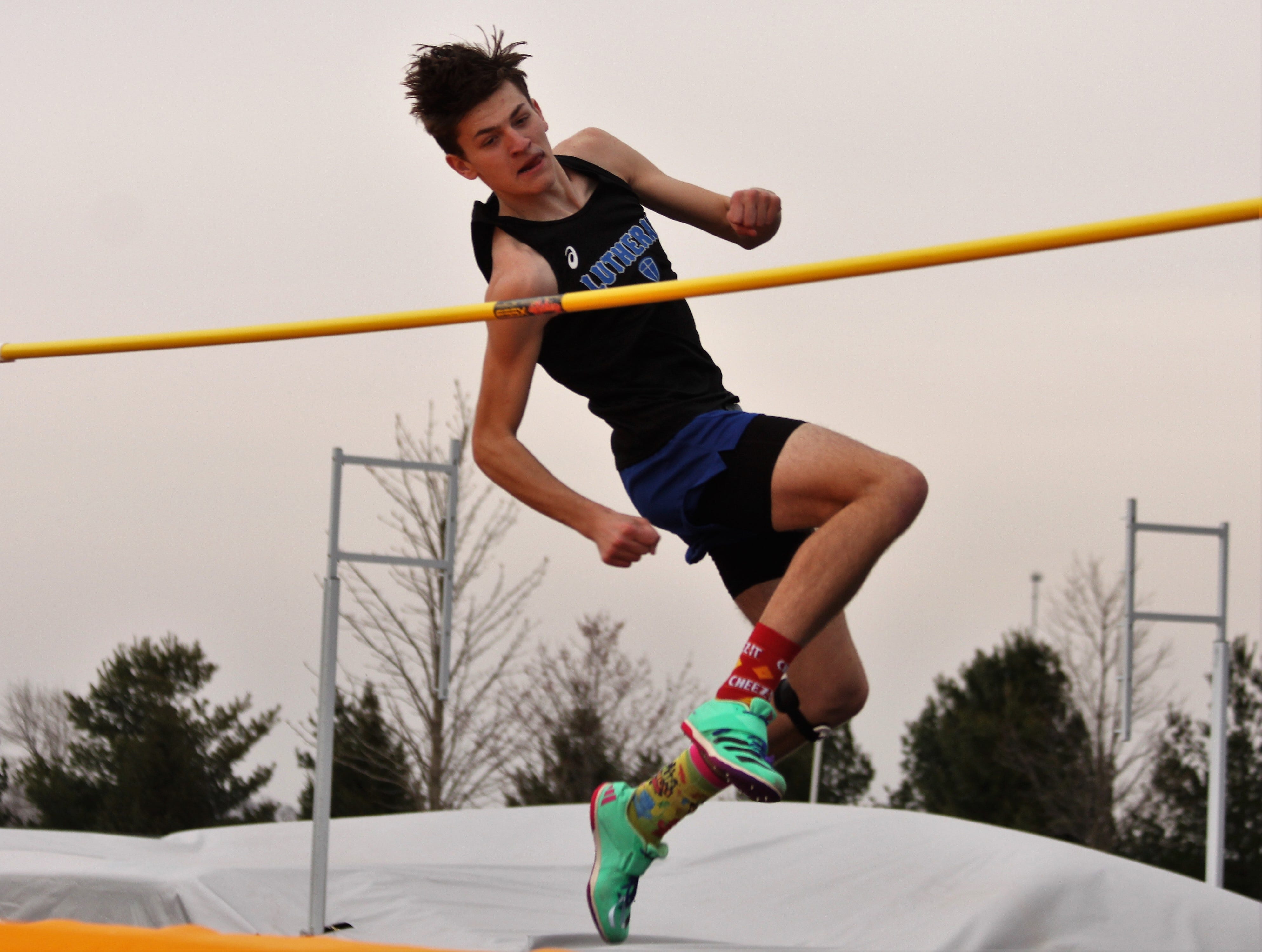 IHSA boys track and field Mason Kooi clears 7 feet in high jump