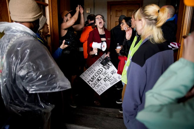 Demonstrators react as the expulsion of Justin Jones, D-Nashville, Justin Pearson, D-Memphis and Gloria Johnson, D-Knoxville, moves ahead at the Tennessee State Capitol in Nashville, Tenn., on Thursday, April 6, 2023. 