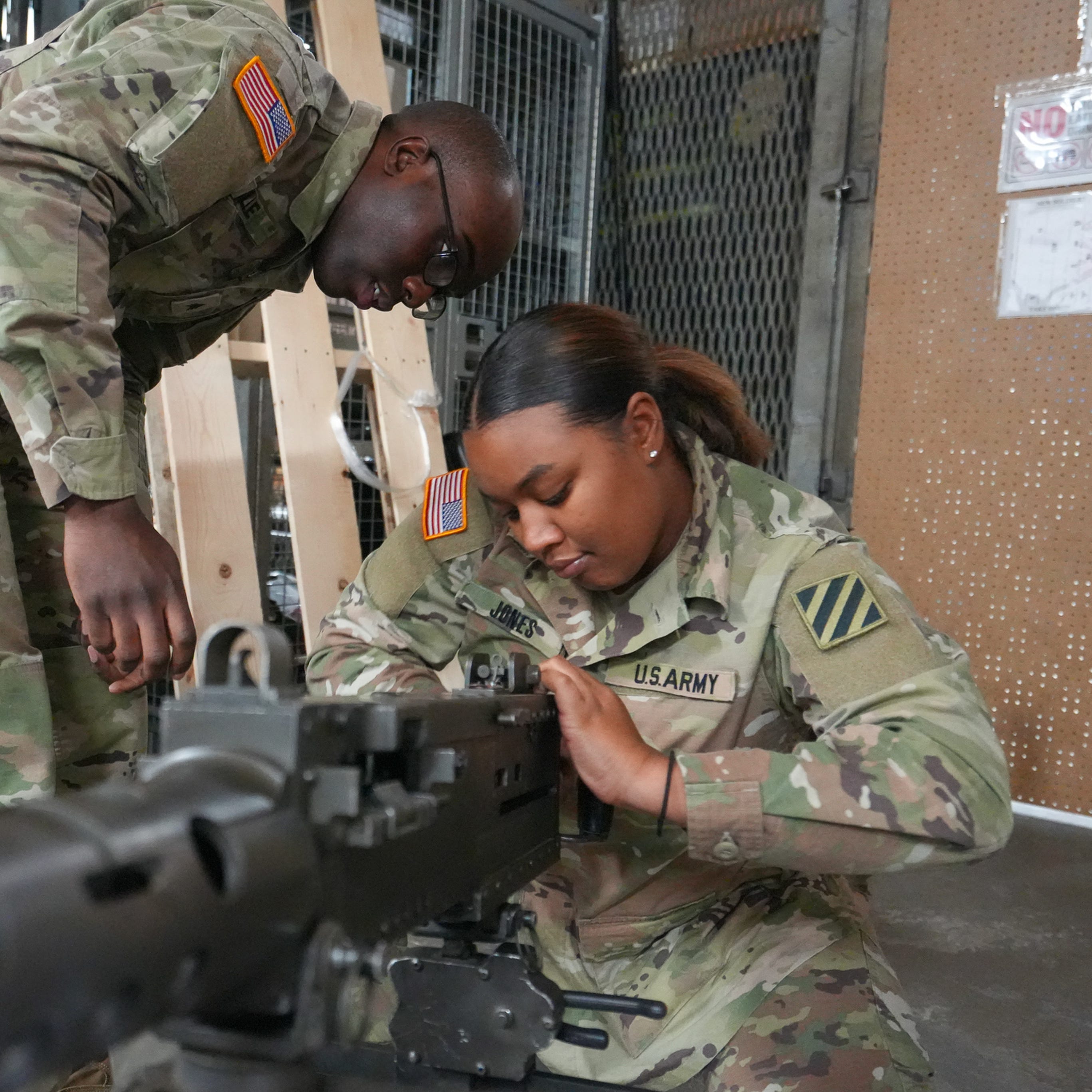 Staff Sergeant Ricora Jones and her crew train on weapons at Ft. Stewart in Georgia on March 20, 2023. Jones trains and works on tanks as an armor crewman, one of few women in the armor and cavalry branch. She's also pregnant with her first child, a boy.