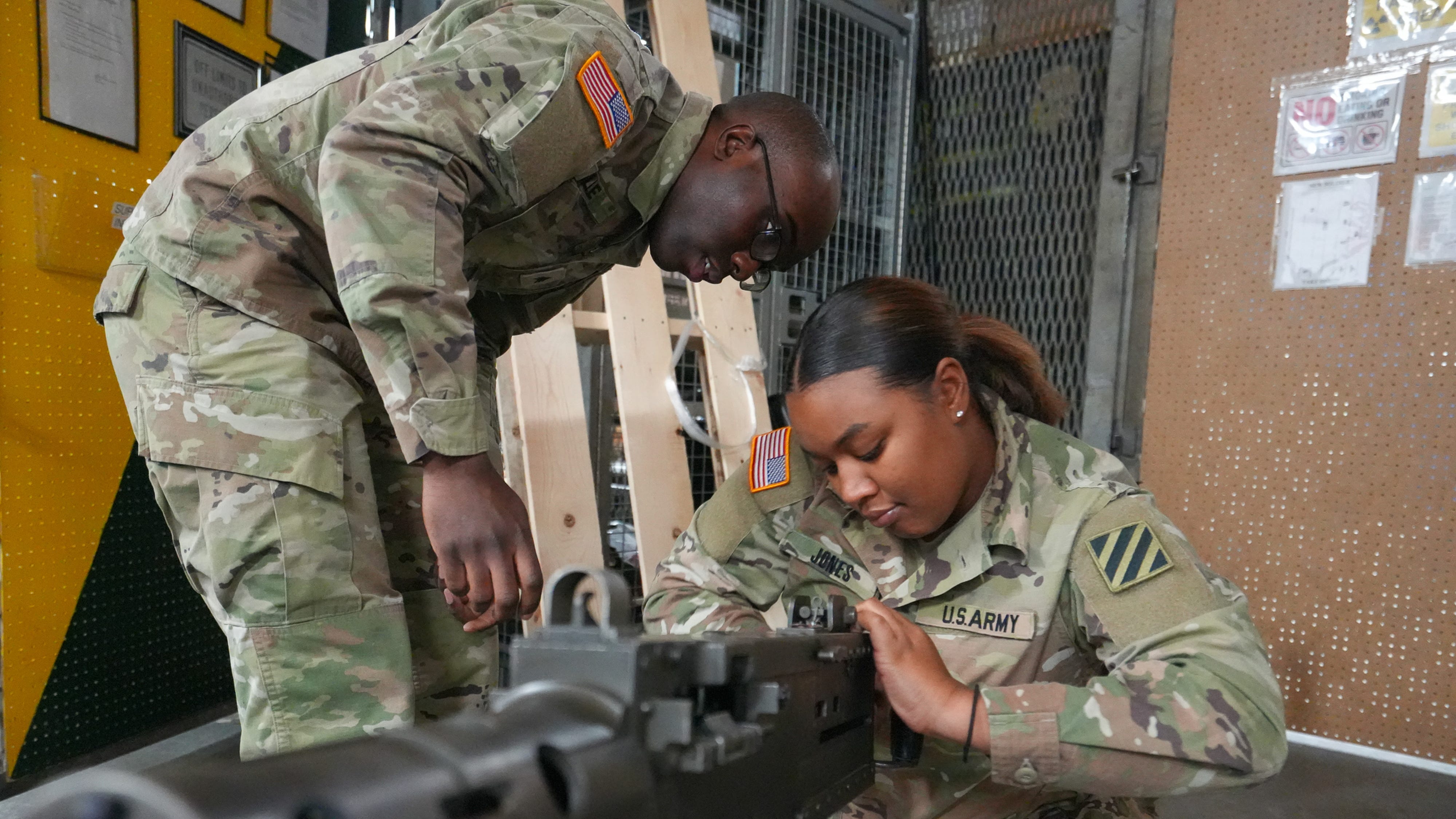 Staff Sergeant Ricora Jones and her crew train on weapons at Ft. Stewart in Georgia on March 20, 2023. Jones trains and works on tanks as an armor crewman, one of few women in the armor and cavalry branch. She's also pregnant with her first child, a boy.