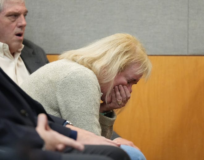 The mother of Daniel Perry cries after he was sentenced for the murder of Garrett Foster at the Blackwell-Thurman Criminal Justice Center on Friday, April 7, 2013.