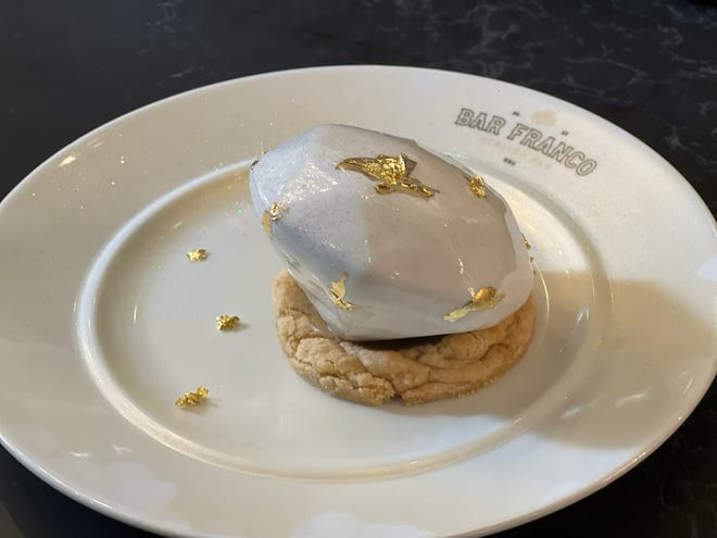 Bar Franco, opening in May, will have a $1,000-dessert on the menu which is flecked with 24-karat gold leaf and served with a diamond-encrusted spoon and a shot of Louis XIII cognac.