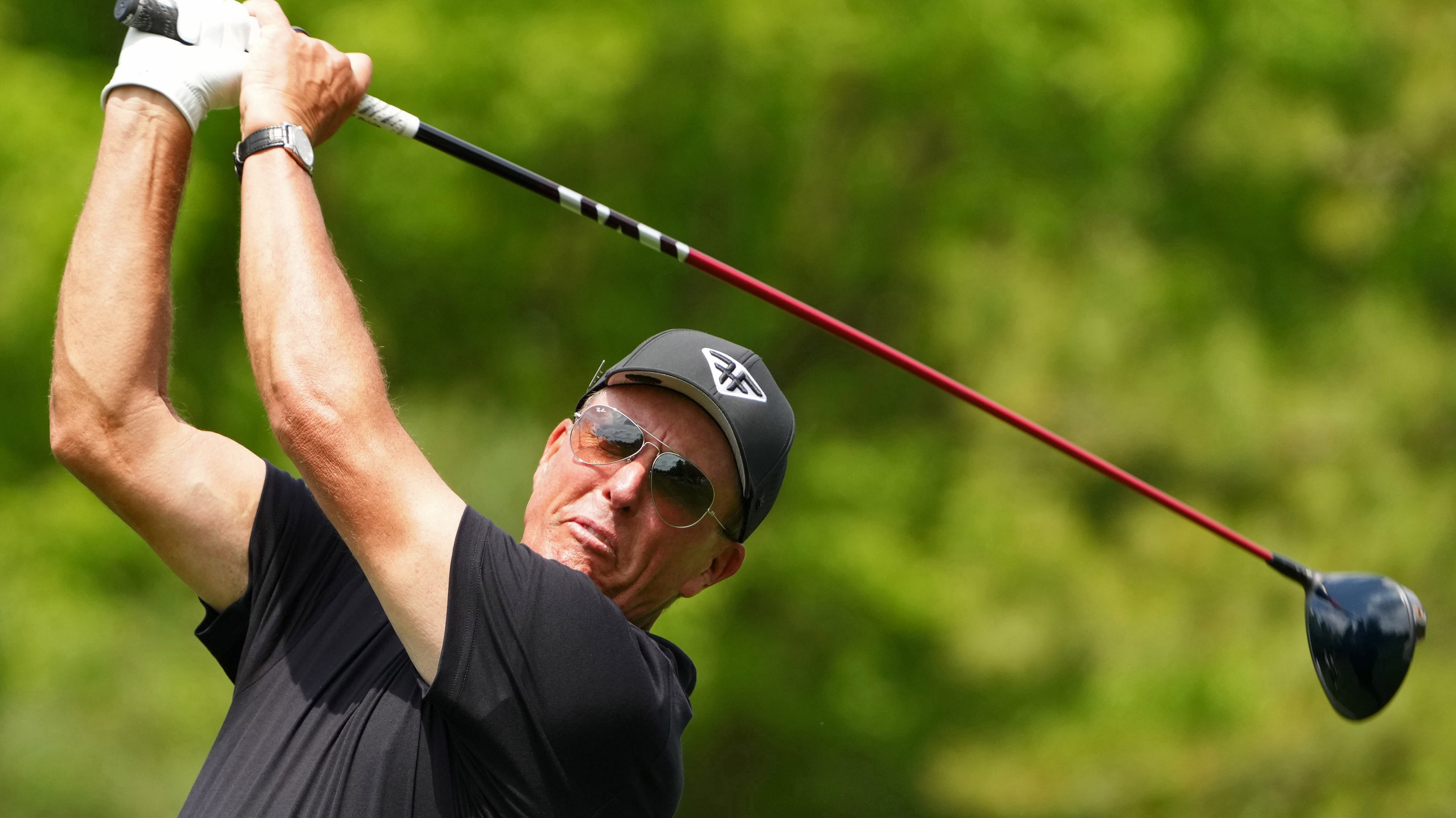 Phil Mickelson tees off on the fifth hole during the first round of The Masters.