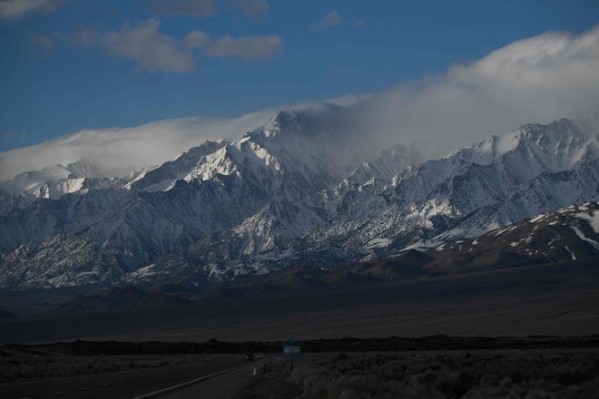 Snowpack on the mountains of the Eastern Sierras after record rain and snow from winter storms in Inyo County, near Independence, California on April 7, 2023.