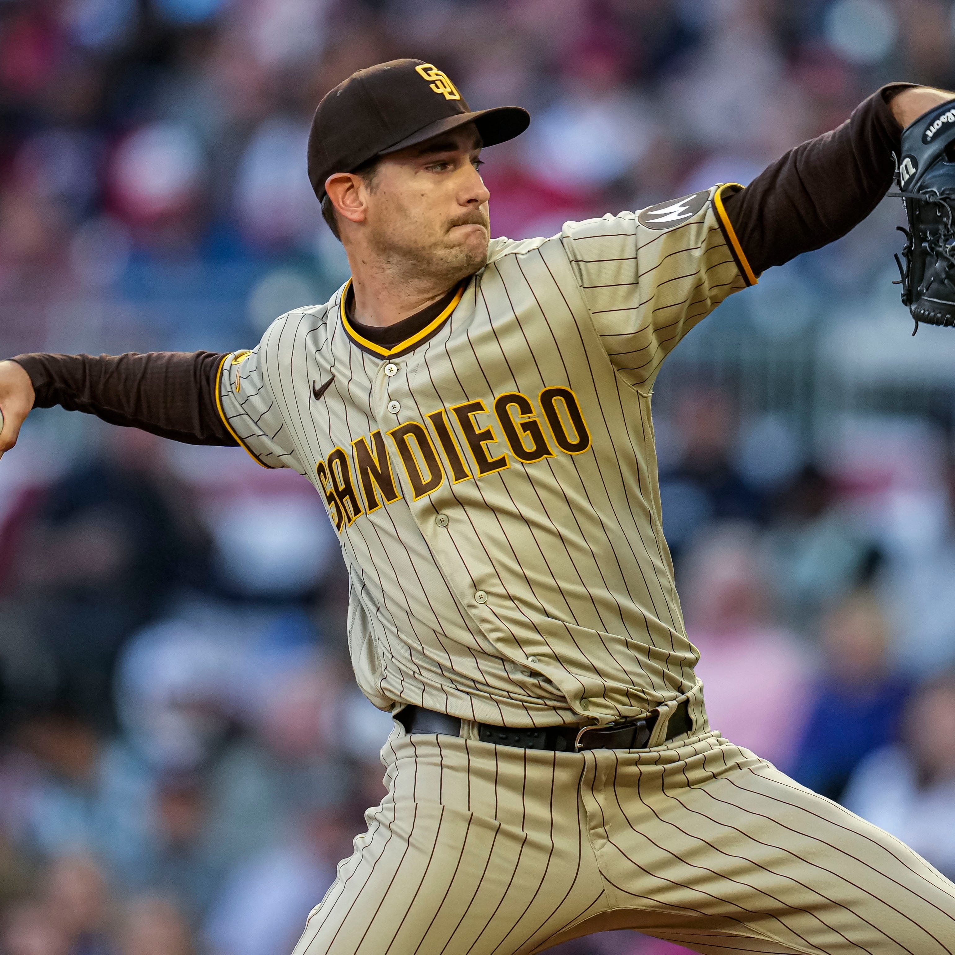 San Diego Padres starting pitcher relief pitcher Seth Lugo (67) (67) pitches against the Atlanta Braves during the second inning on April 9, 2023, at Truist Park. Mandatory Credit: Dale Zanine-USA TODAY Sports