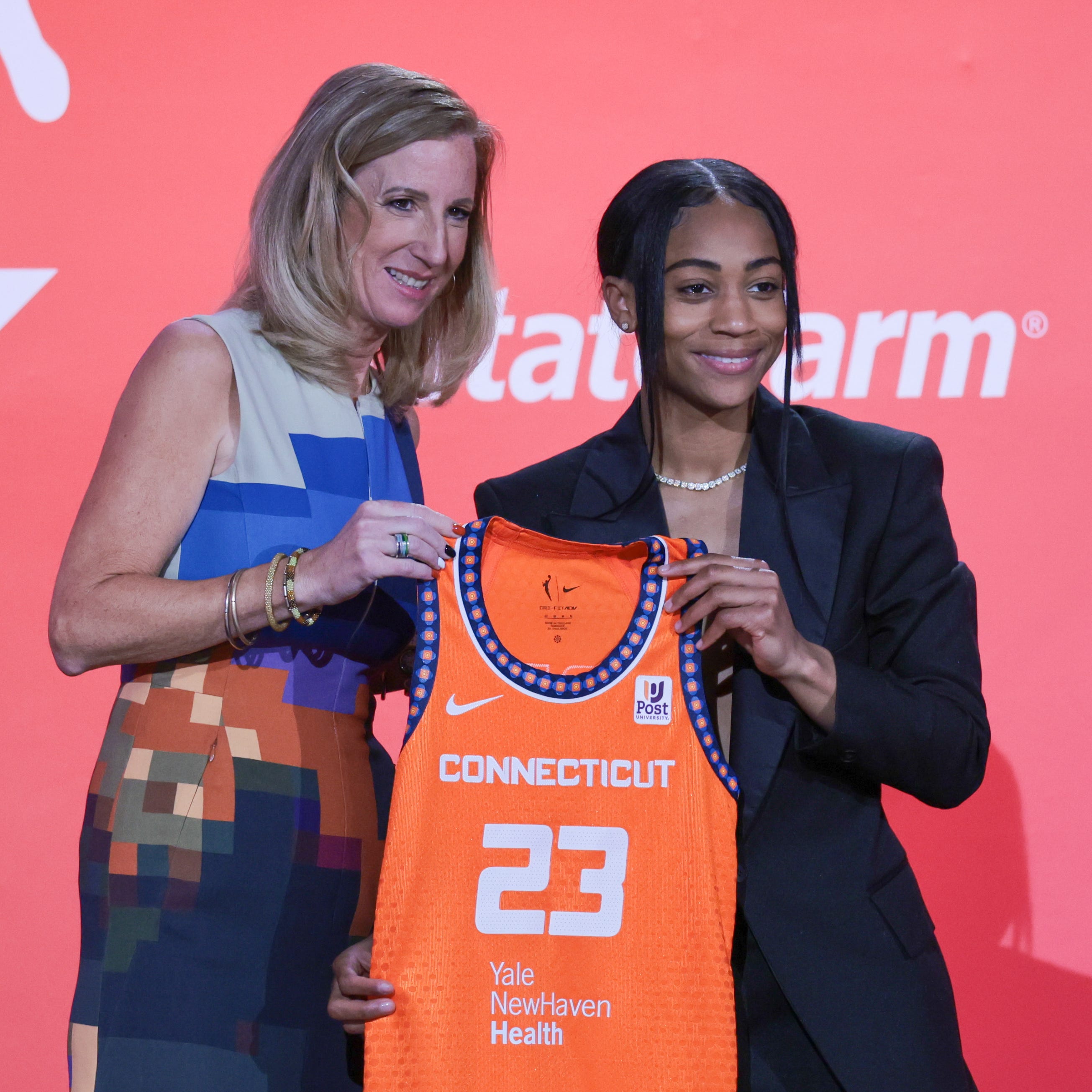 LSU star Alexis Morris poses with WNBA Commissioner Cathy Engelbert after being drafted with the 10th pick of the second round by the Connecticut Sun.